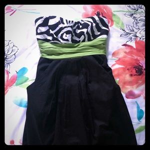 Strapless zebra print dress with green bow